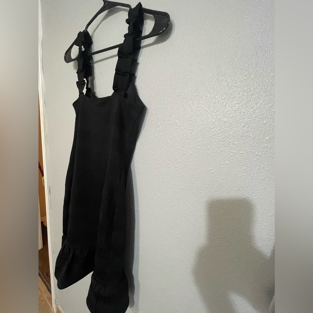 Bebe dress. Black dress , new with tag , never worn
